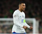 27 March 2023; Kylian Mbappé of France celebrates at the final whistle after his side's victory in the UEFA EURO 2024 Championship Qualifier match between Republic of Ireland and France at Aviva Stadium in Dublin. Photo by Eóin Noonan/Sportsfile