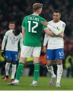 27 March 2023; Nathan Collins of Republic of Ireland with Kylian Mbappé of France after the UEFA EURO 2024 Championship Qualifier match between Republic of Ireland and France at Aviva Stadium in Dublin. Photo by Michael P Ryan/Sportsfile