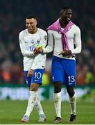 27 March 2023; France players Kylian Mbappé left, and Ibrahima Konaté celebrate after their side's victory in the UEFA EURO 2024 Championship Qualifier match between Republic of Ireland and France at Aviva Stadium in Dublin. Photo by Eóin Noonan/Sportsfile