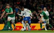 27 March 2023; Kylian Mbappé of France in action against Republic of Ireland players, Nathan Collins, Left and Jayson Molumby during the UEFA EURO 2024 Championship Qualifier match between Republic of Ireland and France at Aviva Stadium in Dublin. Photo by Michael P Ryan/Sportsfile