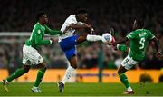27 March 2023; Aurélien Tchouameni of France in action against Republic of Ireland players Chiedozie Ogbene, left, and Michael Obafemi during the UEFA EURO 2024 Championship Qualifier match between Republic of Ireland and France at Aviva Stadium in Dublin. Photo by Eóin Noonan/Sportsfile