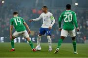 27 March 2023; Kylian Mbappé of Francein action against Republic of Ireland players, Jayson Molumby, Left and Chiedozie Ogbene during the UEFA EURO 2024 Championship Qualifier match between Republic of Ireland and France at Aviva Stadium in Dublin. Photo by Michael P Ryan/Sportsfile