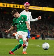 27 March 2023; Jayson Molumby of Republic of Ireland in action against Antoine Griezmann of France during the UEFA EURO 2024 Championship Qualifier match between Republic of Ireland and France at Aviva Stadium in Dublin. Photo by Michael P Ryan/Sportsfile