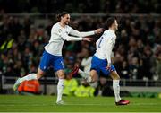 27 March 2023; Benjamin Pavard of France celebrates after scoring his side's first goal with team-mate Adrien Rabiot during the UEFA EURO 2024 Championship Qualifier match between Republic of Ireland and France at Aviva Stadium in Dublin. Photo by Michael P Ryan/Sportsfile