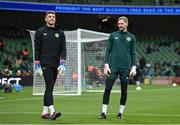 27 March 2023; Republic of Ireland goalkeepers Mark Travers, left, and Caoimhin Kelleher before the UEFA EURO 2024 Championship Qualifier match between Republic of Ireland and France at Aviva Stadium in Dublin. Photo by Seb Daly/Sportsfile
