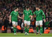 27 March 2023; Republic of Ireland players, from left, Seamus Coleman, Dara O'Shea and Matt Doherty during the UEFA EURO 2024 Championship Qualifier match between Republic of Ireland and France at Aviva Stadium in Dublin. Photo by Seb Daly/Sportsfile