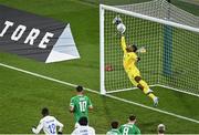 27 March 2023; France goalkeeper Mike Maignan saves the header from Nathan Collins of Republic of Ireland in the closing moments of the UEFA EURO 2024 Championship Qualifier match between Republic of Ireland and France at Aviva Stadium in Dublin. Photo by Piaras Ó Mídheach/Sportsfile