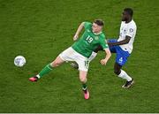27 March 2023; Evan Ferguson of Republic of Ireland in action against Dayot Upamecano of France during the UEFA EURO 2024 Championship Qualifier match between Republic of Ireland and France at the Aviva Stadium in Dublin. Photo by Piaras Ó Mídheach/Sportsfile