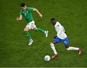 27 March 2023; Randal Kolo Muani of France in action against John Egan of Republic of Ireland during the UEFA EURO 2024 Championship Qualifier match between Republic of Ireland and France at the Aviva Stadium in Dublin. Photo by Piaras Ó Mídheach/Sportsfile