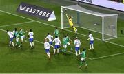 27 March 2023; France goalkeeper Mike Maignan dives to save the header from Nathan Collins of Republic of Ireland in the closing moments of the UEFA EURO 2024 Championship Qualifier match between Republic of Ireland and France at the Aviva Stadium in Dublin. Photo by Piaras Ó Mídheach/Sportsfile