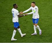 27 March 2023; Kylian Mbappé of France celebrates with teammate Marcus Thuram, left, after their side's victory in the UEFA EURO 2024 Championship Qualifier match between Republic of Ireland and France at the Aviva Stadium in Dublin. Photo by Piaras Ó Mídheach/Sportsfile