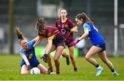 28 March 2023; Isabel O'Connor of Loreto St Michael's in action against Hannah Sheehy, left, and Ava Palasz of Sacred Heart during the Lidl All Ireland Post Primary School Senior ‘A’ Championship Final match between Sacred Heart School in Westport, Mayo, and Loreto St Michael’s in Navan, Meath, at Glennon Brothers Pearse Park in Longford. Photo by Ben McShane/Sportsfile