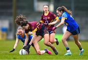 28 March 2023; Isabel O'Connor of Loreto St Michael's in action against Hannah Sheehy, left, and Ava Palasz of Sacred Heart during the Lidl All Ireland Post Primary School Senior ‘A’ Championship Final match between Sacred Heart School in Westport, Mayo, and Loreto St Michael’s in Navan, Meath, at Glennon Brothers Pearse Park in Longford. Photo by Ben McShane/Sportsfile