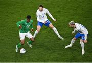 27 March 2023; Chiedozie Ogbene of Republic of Ireland in action against Adrien Rabiot and Theo Hernández of France during the UEFA EURO 2024 Championship Qualifier match between Republic of Ireland and France at the Aviva Stadium in Dublin. Photo by Piaras Ó Mídheach/Sportsfile