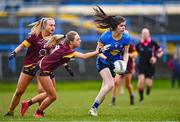 28 March 2023; Sorcha McCarney of Sacred Heart in action against Sarah Jane Lyons of Loreto St Michael's during the Lidl All Ireland Post Primary School Senior ‘A’ Championship Final match between Sacred Heart School in Westport, Mayo, and Loreto St Michael’s in Navan, Meath, at Glennon Brothers Pearse Park in Longford. Photo by Ben McShane/Sportsfile