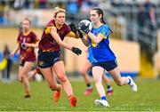 28 March 2023; Christina McEvilly of Sacred Heart in action against Zoe Harte of Loreto St Michael's during the Lidl All Ireland Post Primary School Senior ‘A’ Championship Final match between Sacred Heart School in Westport, Mayo, and Loreto St Michael’s in Navan, Meath, at Glennon Brothers Pearse Park in Longford. Photo by Ben McShane/Sportsfile