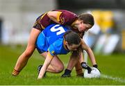 28 March 2023; Ava Kelly of Sacred Heart and Lauren Woods of Loreto St Michael's contest a loose ball during the Lidl All Ireland Post Primary School Senior ‘A’ Championship Final match between Sacred Heart School in Westport, Mayo, and Loreto St Michael’s in Navan, Meath, at Glennon Brothers Pearse Park in Longford. Photo by Ben McShane/Sportsfile