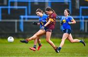 28 March 2023; Lauren Woods of Loreto St Michael's scores her side's third goal despite the attention of Eimear Geraghty of Sacred Heart during the Lidl All Ireland Post Primary School Senior ‘A’ Championship Final match between Sacred Heart School in Westport, Mayo, and Loreto St Michael’s in Navan, Meath, at Glennon Brothers Pearse Park in Longford. Photo by Ben McShane/Sportsfile