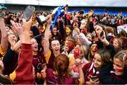 28 March 2023; Loreto St Michael's captain Lilly Dwyer celebrates with the cup and supporters after the Lidl All Ireland Post Primary School Senior ‘A’ Championship Final match between Sacred Heart School in Westport, Mayo, and Loreto St Michael’s in Navan, Meath, at Glennon Brothers Pearse Park in Longford. Photo by Ben McShane/Sportsfile