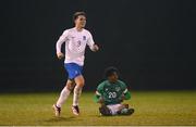 28 March 2023; Nikolaos Deligiannis of Greece celebrates as Franco Umeh of Republic of Ireland reacts to his side's defeat in the UEFA European Under-19 Championship Elite Round match between Greece and Republic of Ireland at Ferrycarrig Park in Wexford. Photo by Stephen McCarthy/Sportsfile