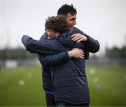 28 March 2023; Kevin Zefi of Republic of Ireland and Greece goalkeeper Nikolaos Botis, right, before the UEFA European Under-19 Championship Elite Round match between Greece and Republic of Ireland at Ferrycarrig Park in Wexford. Photo by Stephen McCarthy/Sportsfile