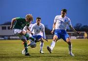 28 March 2023; Harry Vaughan of Republic of Ireland in action against Anastasios Symeonidis and Georgios Koutsias, right, of Greece during the UEFA European Under-19 Championship Elite Round match between Greece and Republic of Ireland at Ferrycarrig Park in Wexford. Photo by Stephen McCarthy/Sportsfile