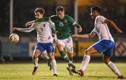 28 March 2023; Oisin Gallagher of Republic of Ireland in action against Nikolaos Deligiannis, left, and Dimitrios Keramitsis of Greece during the UEFA European Under-19 Championship Elite Round match between Greece and Republic of Ireland at Ferrycarrig Park in Wexford. Photo by Stephen McCarthy/Sportsfile