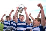27 March 2023; Luka Kelly of Blackrock College lifts the trophy after his side's victory in the Bank of Ireland Leinster Rugby Schools Junior Cup Final match between St Michael's College and Blackrock College at Energia Park in Dublin. Photo by Harry Murphy/Sportsfile