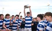 27 March 2023; Jamie Shanley of Blackrock College lifts the trophy after his side's victory in the Bank of Ireland Leinster Rugby Schools Junior Cup Final match between St Michael's College and Blackrock College at Energia Park in Dublin. Photo by Harry Murphy/Sportsfile