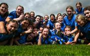 30 March 2023; Convent of Mercy Roscommon captain Aisling Hanly, centre, and team mates celebrate with the trophy after the Lidl All Ireland Post Primary School Senior ‘B’ Championship Final match between Convent of Mercy, Roscommon and Mercy Mounthawk, Kerry, at MacDonagh Park in Nenagh, Tipperary. Photo by David Fitzgerald/Sportsfile