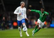 27 March 2023; Theo Hernández of France and Chiedozie Ogbene of Republic of Ireland during the UEFA EURO 2024 Championship Qualifier match between Republic of Ireland and France at Aviva Stadium in Dublin. Photo by Stephen McCarthy/Sportsfile