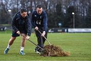 31 March 2023; UCD coaching staff members Daragh Geraghty, left, and Shane Geraghty clear water from the pitch before the annual rugby colours match between University College Dublin and Dublin University at the UCD Bowl in Belfield, Dublin. Photo by Sam Barnes/Sportsfile