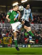 31 March 2023; Jonas Hakkinen of Cork City in action against Dylan Grimes of Drogheda United during the SSE Airtricity Men's Premier Division match between Cork City and Drogheda United at Turner's Cross in Cork. Photo by Eóin Noonan/Sportsfile