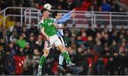 31 March 2023; Joshua Honohan of Cork City in action against Dylan Grimes of Drogheda United during the SSE Airtricity Men's Premier Division match between Cork City and Drogheda United at Turner's Cross in Cork. Photo by Eóin Noonan/Sportsfile