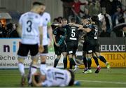 31 March 2023; Lee Grace of Shamrock Rovers, 5, celebrates with teammates after scoring their side's second goal during the SSE Airtricity Men's Premier Division match between Dundalk and Shamrock Rovers at Oriel Park in Dundalk, Louth. Photo by Ramsey Cardy/Sportsfile