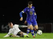 31 March 2023; Dean McMenamy of Waterford is tackled by Ryan Rainey of Finn Harps during the SSE Airtricity Men's First Division match between Waterford and Finn Harps at RSC in Waterford. Photo by Michael P Ryan/Sportsfile
