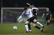 31 March 2023; Alfie Lewis of Dundalk in action against Gary O'Neill of Shamrock Rovers during the SSE Airtricity Men's Premier Division match between Dundalk and Shamrock Rovers at Oriel Park in Dundalk, Louth. Photo by Ramsey Cardy/Sportsfile