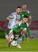 31 March 2023; Aaron Bolger of Cork City is tackled by Ryan Brennan of Drogheda United during the SSE Airtricity Men's Premier Division match between Cork City and Drogheda United at Turner's Cross in Cork. Photo by Eóin Noonan/Sportsfile