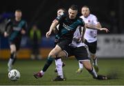31 March 2023; Gary O'Neill of Shamrock Rovers is tackled by Robbie McCourt of Dundalk during the SSE Airtricity Men's Premier Division match between Dundalk and Shamrock Rovers at Oriel Park in Dundalk, Louth. Photo by Ramsey Cardy/Sportsfile