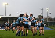 31 March 2023; Eadaoin Murtagh of UCD celebrates with teammates after scoring her side's third try during the Annual Women's Rugby Colours match between University College Dublin and Dublin University at UCD Bowl in Belfield, Dublin. Photo by Harry Murphy/Sportsfile