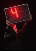 31 March 2023; Fourth official Daniel Murphy displays the board showing four minutes additional time at the end of the second half during the SSE Airtricity Men's First Division match between Athlone Town and Galway United at Athlone Town Stadium in Westmeath. Photo by Stephen Marken/Sportsfile