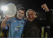 31 March 2023; Bill Burns of UCD celebrates with his father Willie Burns after his side's victory in the annual rugby colours match between University College Dublin and Dublin University at the UCD Bowl in Belfield, Dublin. Photo by Sam Barnes/Sportsfile