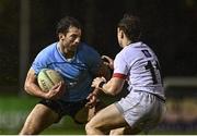 31 March 2023; Ross Deegan of UCD in action against Ronan Quinn of DUFC during the annual rugby colours match between University College Dublin and Dublin University at the UCD Bowl in Belfield, Dublin. Photo by Sam Barnes/Sportsfile