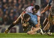 31 March 2023; Sean O'Brien of UCD is tackled by Gavin Jones of DUFC during the annual rugby colours match between University College Dublin and Dublin University at the UCD Bowl in Belfield, Dublin. Photo by Sam Barnes/Sportsfile