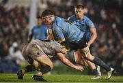 31 March 2023; Sean O'Brien of UCD is tackled by Aran Egan of DUFC during the annual rugby colours match between University College Dublin and Dublin University at the UCD Bowl in Belfield, Dublin. Photo by Sam Barnes/Sportsfile