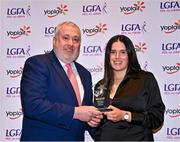 31 March 2023; Lily Vickers of ATU Sligo receives her Yoplait Rising Stars award from Ladies HEC chairperson Daniel Caldwell at the 2022 Yoplait HEC All Stars evening, at the Dublin Bonnington Hotel in Dublin. Photo by Piaras Ó Mídheach/Sportsfile