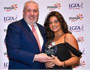 31 March 2023; Ellen Donoghue of University of Galway receives her Yoplait Rising Stars award from Ladies HEC chairperson Daniel Caldwell at the 2022 Yoplait HEC All Stars evening, at the Dublin Bonnington Hotel in Dublin. Photo by Piaras Ó Mídheach/Sportsfile