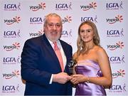 31 March 2023; Iris Kennelly of TUS Midwest receives her Yoplait Rising Stars award from Ladies HEC chairperson Daniel Caldwell at the 2022 Yoplait HEC All Stars evening, at the Dublin Bonnington Hotel in Dublin. Photo by Piaras Ó Mídheach/Sportsfile