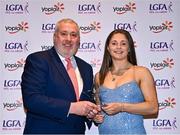 31 March 2023; Dara Kiniry of University of Limerick receives her Yoplait All-Stars award from Ladies HEC chairperson Daniel Caldwell at the 2022 Yoplait HEC All Stars evening, at the Dublin Bonnington Hotel in Dublin. Photo by Piaras Ó Mídheach/Sportsfile