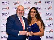 31 March 2023; Erika O'Shea of University of Limerick receives her Yoplait All-Stars award from Ladies HEC chairperson Daniel Caldwell at the 2022 Yoplait HEC All Stars evening, at the Dublin Bonnington Hotel in Dublin. Photo by Piaras Ó Mídheach/Sportsfile